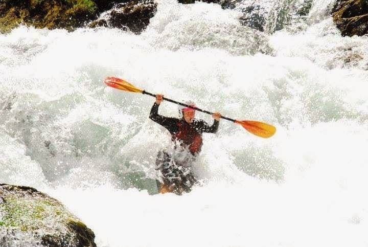 Nicholas learning to kayak in California on the American River